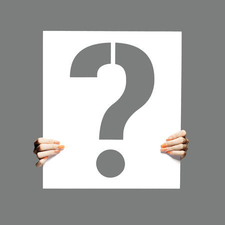 question mark sign being hold by sexy female handsの写真素材
