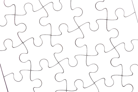 jigsaw puzzle. white pieces forming flawless patternの写真素材