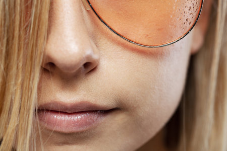 Portrait of a woman with wearing wet glasses
