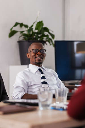 Business people having a creative meeting. Successful african american businessman at a meeting.