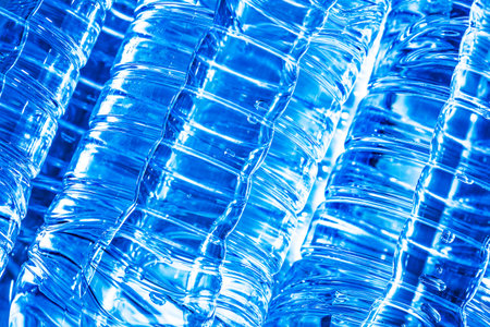 abstract close up pile of plastic water bottlesの写真素材