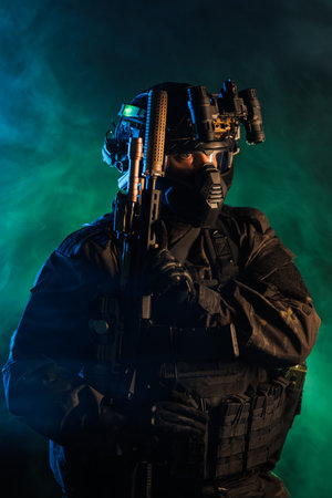 A figure in tactical gear and night vision equipment, posing stoically amidst a green-tinged...