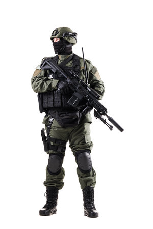 Military special forces soldier fully armed in tactical gear in actionの写真素材