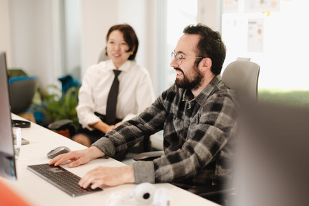 Business professionals collaborate in modern office setting while discussing projects and sharing ideas on a sunny day