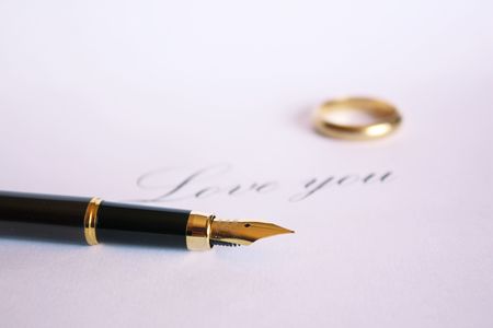 writing love you (pink soft background)の写真素材