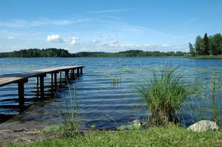 footbridge over lakeの写真素材
