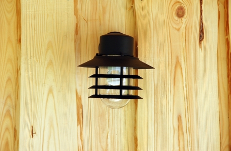 lantern on the wooden wallの写真素材