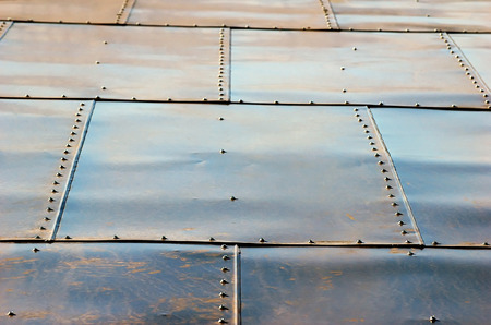 squared tin roof with screwsの写真素材