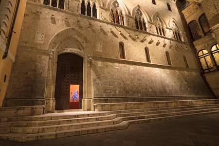 Siena, January 2016: Main Gate of Monte dei Paschi Bank in Piazza Salimbeni on January 2016 in Siena, Tuscany, Italyのeditorial素材