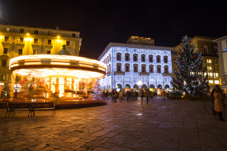 Florence, January 2017: Piazza della Repubblica with Old carousel and Christmas tree on January 2017 in Florence, Tuscany, Italyのeditorial素材