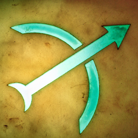 Bright tiles with Sagittarius zodiac signs in a square of Florence, Italyの写真素材