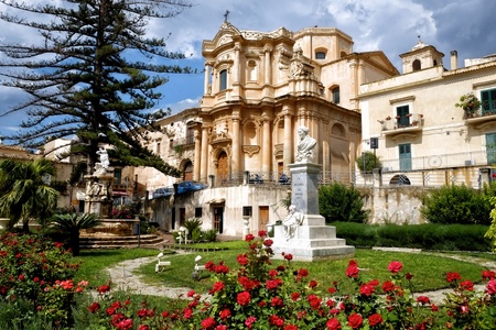 Cathedral in Noto with clouds, Sicilyの写真素材