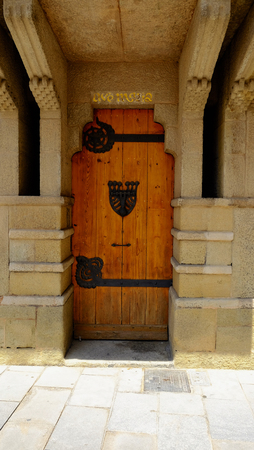 Old wooden door with ornamentの写真素材