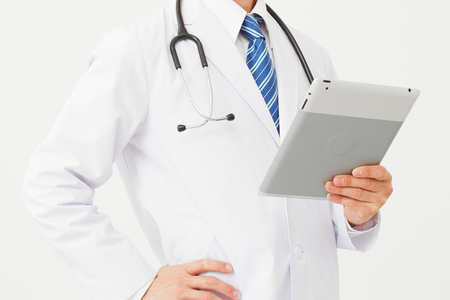 the doctor with tablet, no faceの写真素材