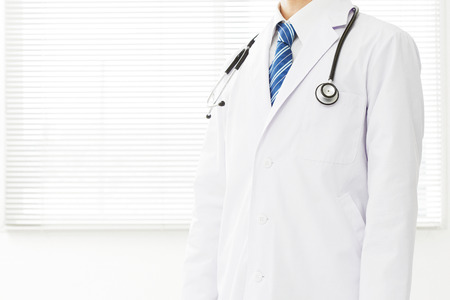 the standing doctor, no faceの写真素材