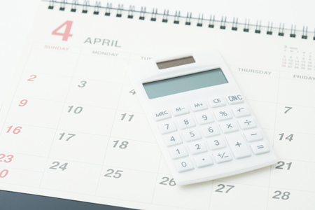 close up of the calendar and the calculatorの写真素材