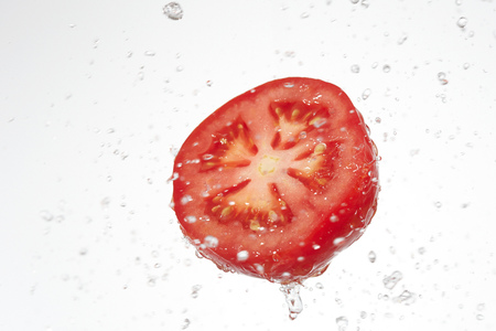 the broccoli with water splashの写真素材