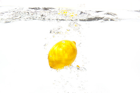 the lemon under the waterの写真素材