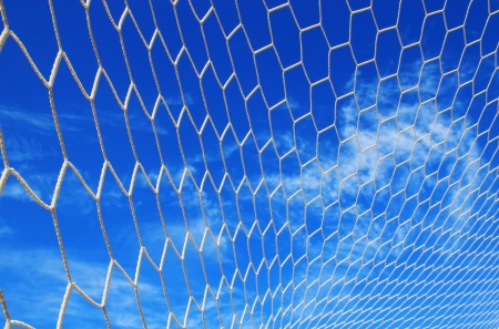 White net football, soccer ,blue blue sky backgroundの写真素材