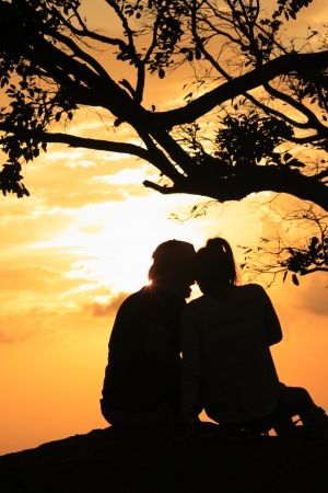 a couple, man and woman in sunsetの写真素材