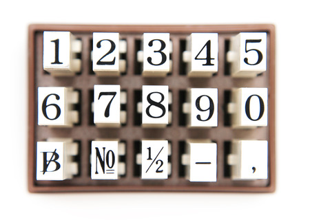 Numberic stamper isolate on white background.の写真素材