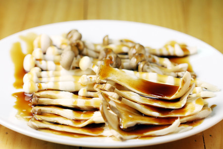 Brown Mushroom on dish with sauce,close up の写真素材