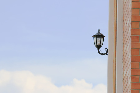 Old style Street lamp on wall.の写真素材