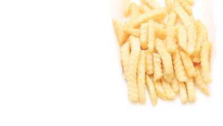 Close up French fries potatoes isolated on white background.