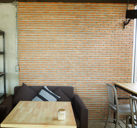 Vintage sofa and wood table chair in cafe.の写真素材