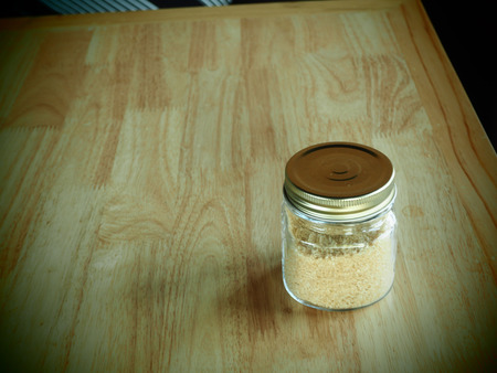 Vintage, Sugar bottle on wood table.の写真素材