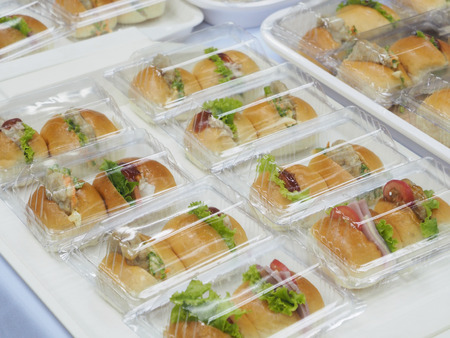 Bread, Salad and pork pack in plastic box, for meeting break.の写真素材