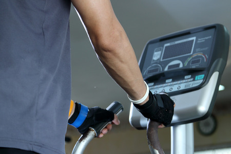 Exercising in the gym,Man walking on treadmill.