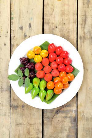 Thai dessert, deletable imitation fruits on white dish.View from above.の写真素材