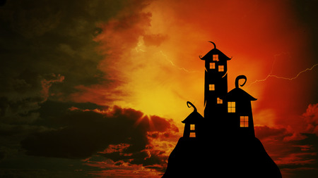 Halloween Nightly Background with castle silhouette on the hill against dramatic clouds sky.の写真素材