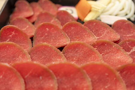 Pork, beef, slides placed in the tray served, at the restaurant.の写真素材
