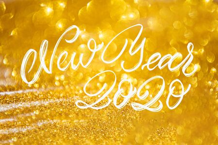 Happy New Year Calligraphy text with colorful hand drawn snowflakes Over Glitter background .Decorative Christmas and New Year party background. Happy New Year 2020 Celebration text.の写真素材