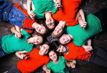 Group of people in circle . Friends looking up. Concepts about friendship,lifestyle,unity,business...