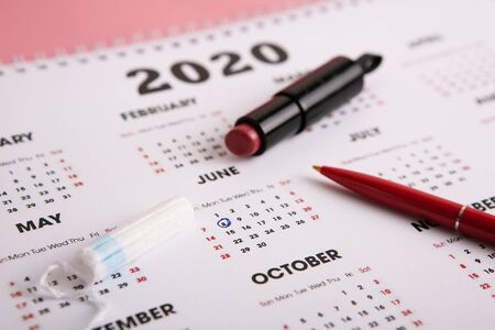 Medical female tampon with calendar. Hygienic white tampon for women. Menstruation,protection. Tamponsの写真素材