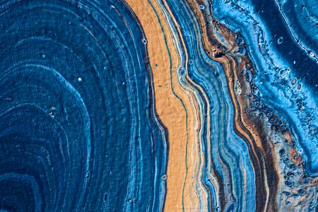 Beautiful textured blue background. Color of the year 2020. Main trend concept. Made with fluid art technique. Trendy colorful backdrop.の写真素材