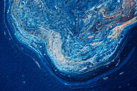 Beautiful textured blue background. Color of the year 2020. Main trend concept. Made with fluid art...