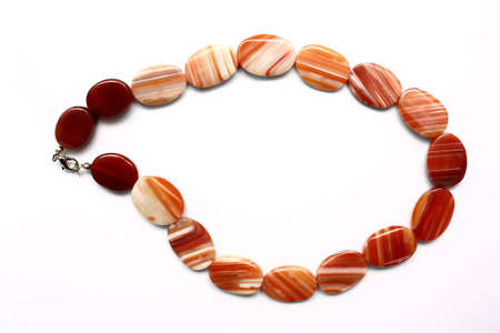 Red Women's necklace on a white backgroundの写真素材
