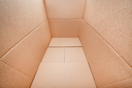 Empty open cardboard box close-up. Packing for cargo.