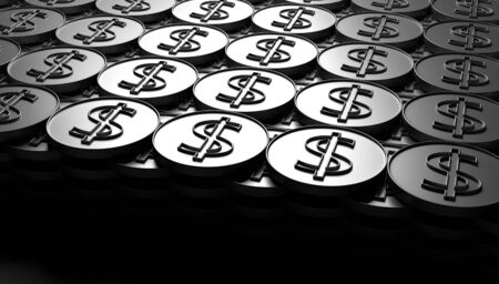 Bars of silver coins on a black background.の写真素材