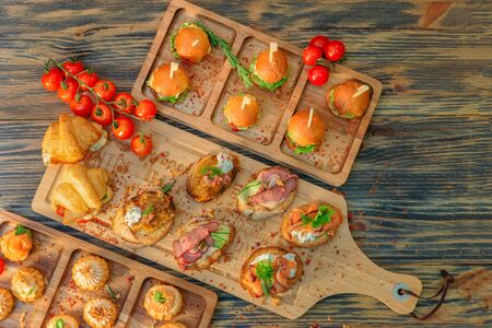 Croissants with ham and greens. Profitroli with cream fillingの写真素材