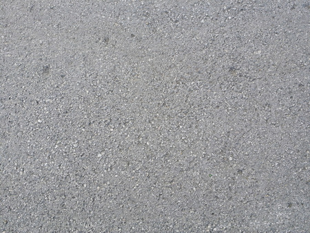 Grey background with asphalt texture for design.の写真素材