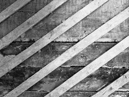 Damaged old grunge wood black and white wall texture surface of houseの写真素材