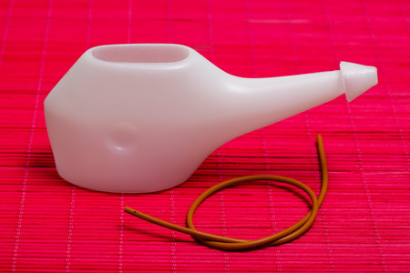 Cleaning procedures for the body. nasal irrigation with salty water and rubber catheterの写真素材