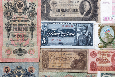 old banknotes of different years of Russian history from the tsarist era to the Soviet period