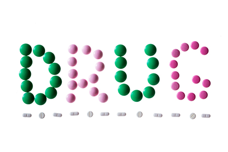 text drug made up of multi-colored pillsの写真素材