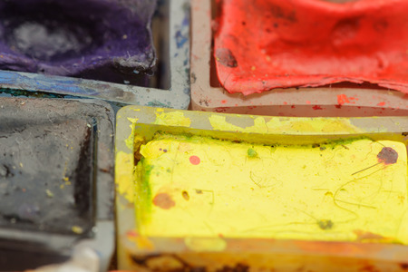 Old watercolor paints. Tools for creativity and craftsの写真素材